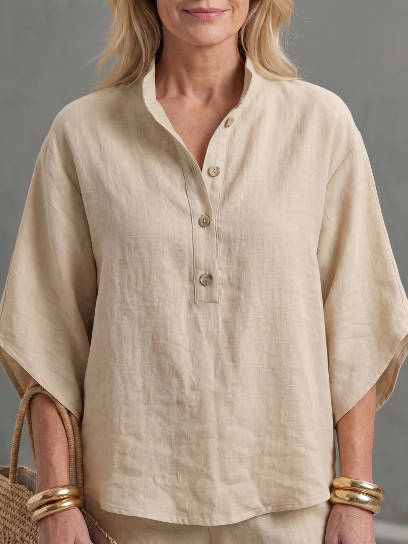 Beige button-front tunic with half-sleeves and round buttons