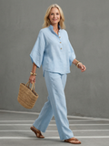 Sky blue button-front tunic and relaxed straight-leg trouser set, 3/4 sleeves