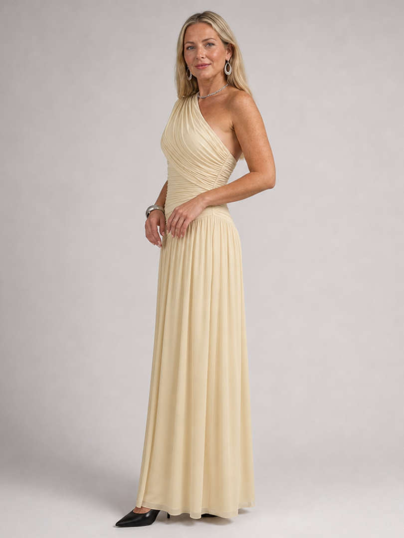 Beige one-shoulder draped maxi dress with gathered waist and pleated skirt
