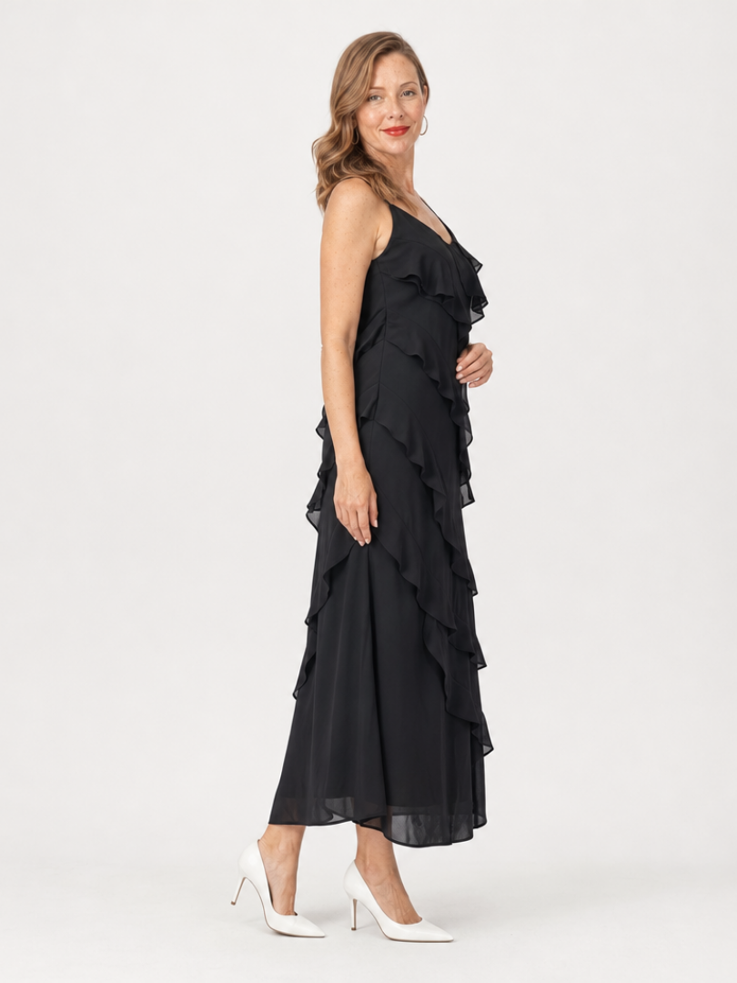 Women's black spaghetti-strap ruffle maxi dress, side view with tiered layers
