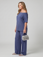 Navy off-shoulder short sleeve top with wide-leg pants, side view set.