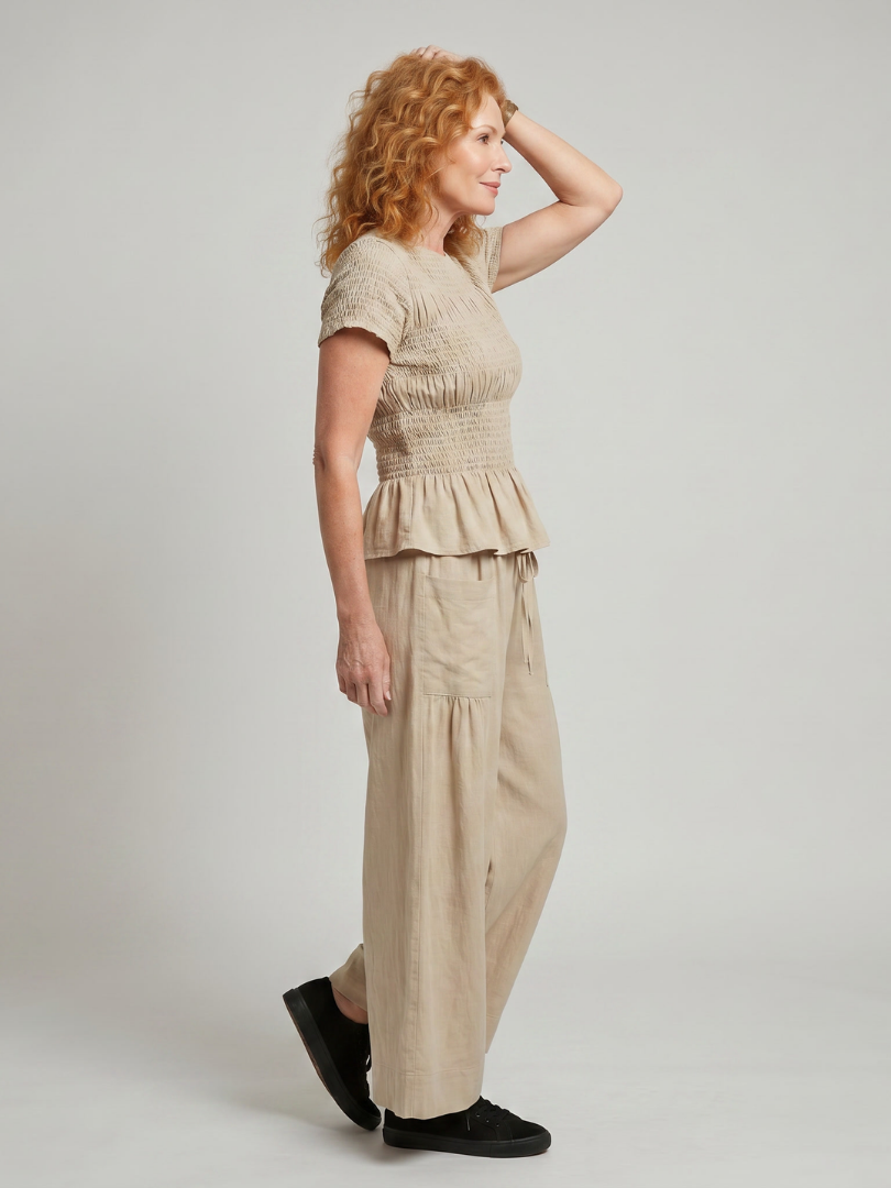 Eirenne | Women's Peplum Smocked Top and Wide Leg Pants Set-Trendyssimo