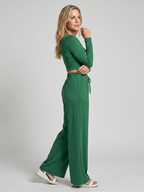 Green long-sleeve crop top with matching wide-leg pants, tie waist.