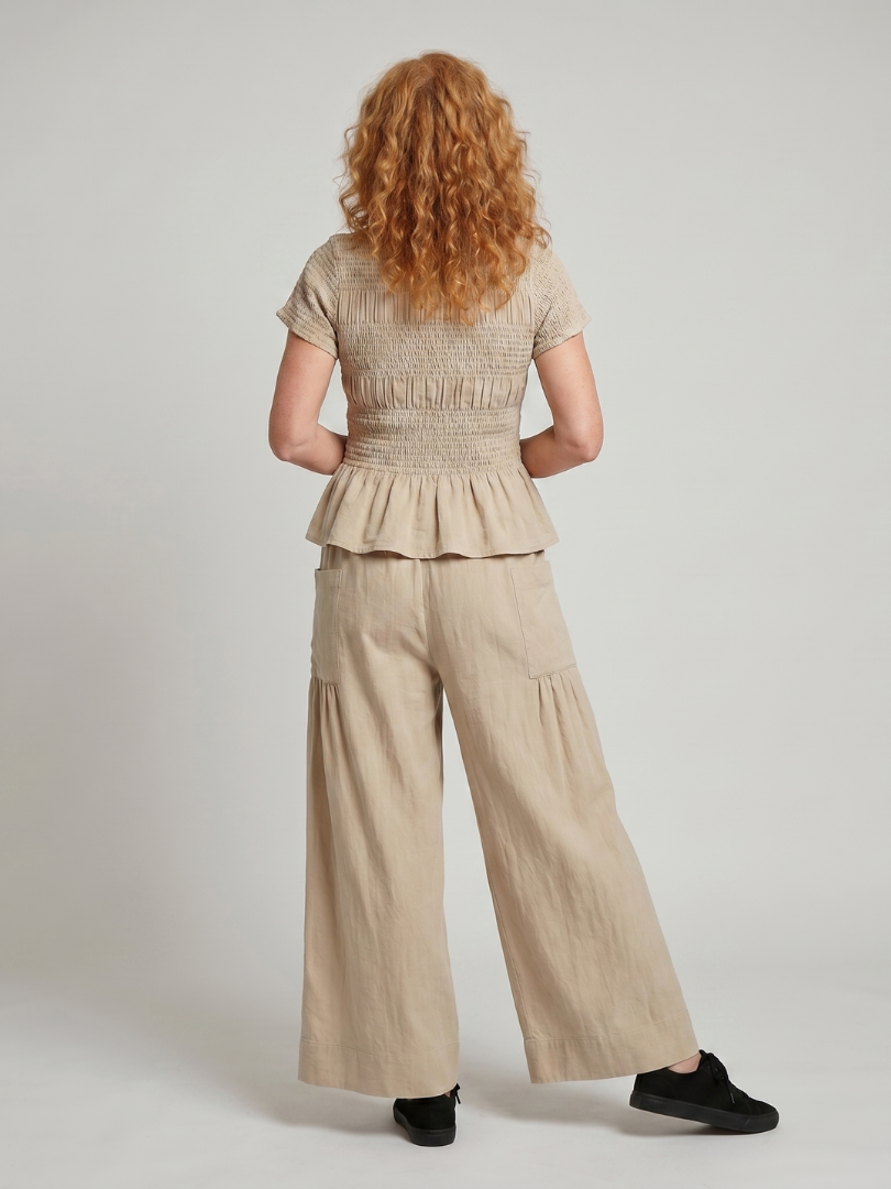 Eirenne | Women's Peplum Smocked Top and Wide Leg Pants Set-Trendyssimo