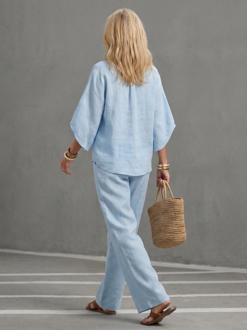 Sky blue button-front tunic and wide-leg trouser set, back view