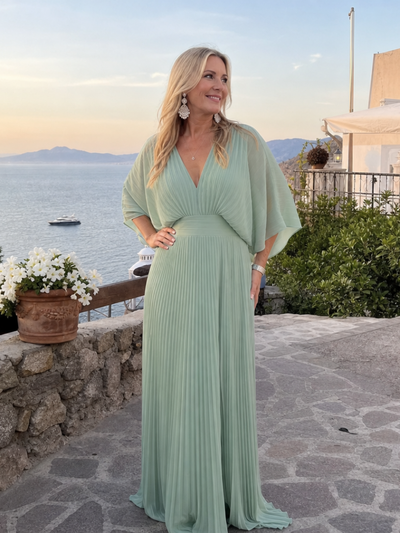Mint green v-neck pleated maxi dress with 3/4 sleeves and gathered waist