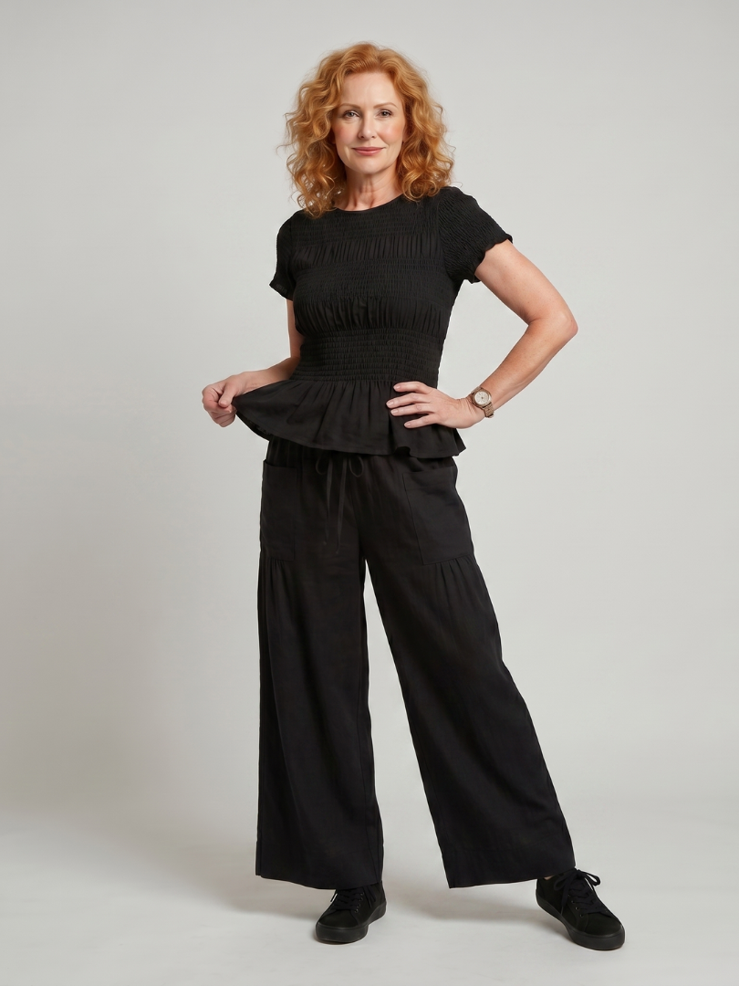 Eirenne | Women's Peplum Smocked Top and Wide Leg Pants Set-Trendyssimo